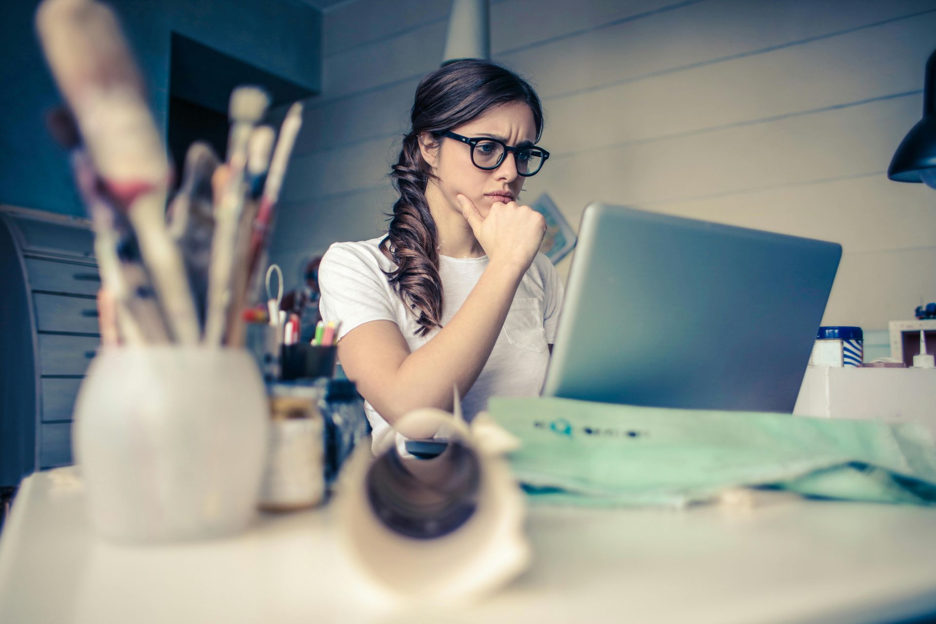 Woman reviewing her finances on a laptop